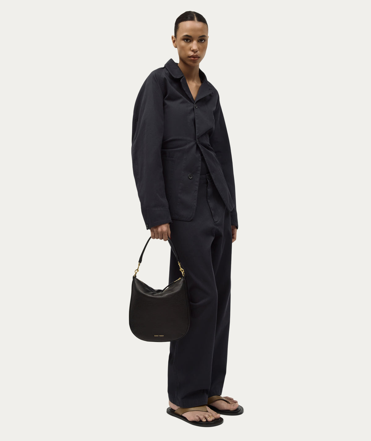 Medium Sling Bag - Black Bulle/Brass